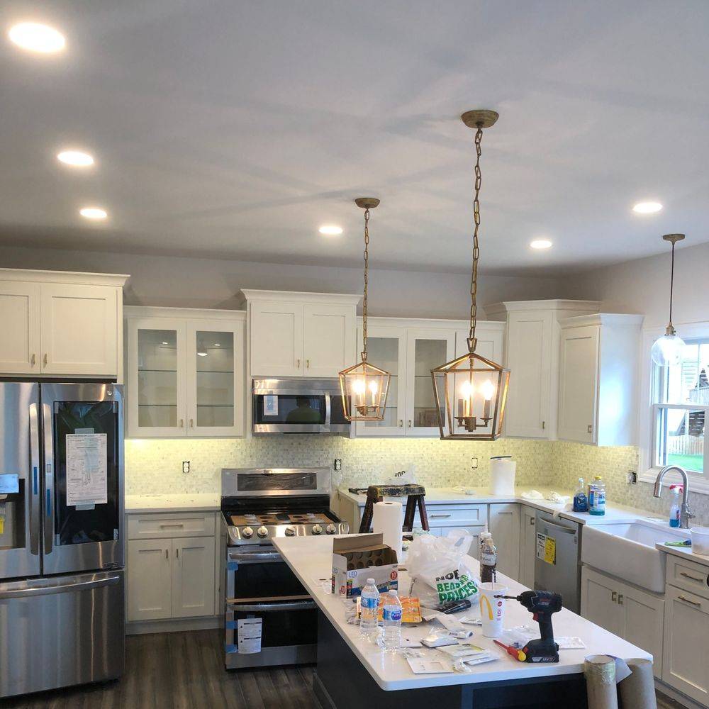 Kitchen with recessed and pendant lighting