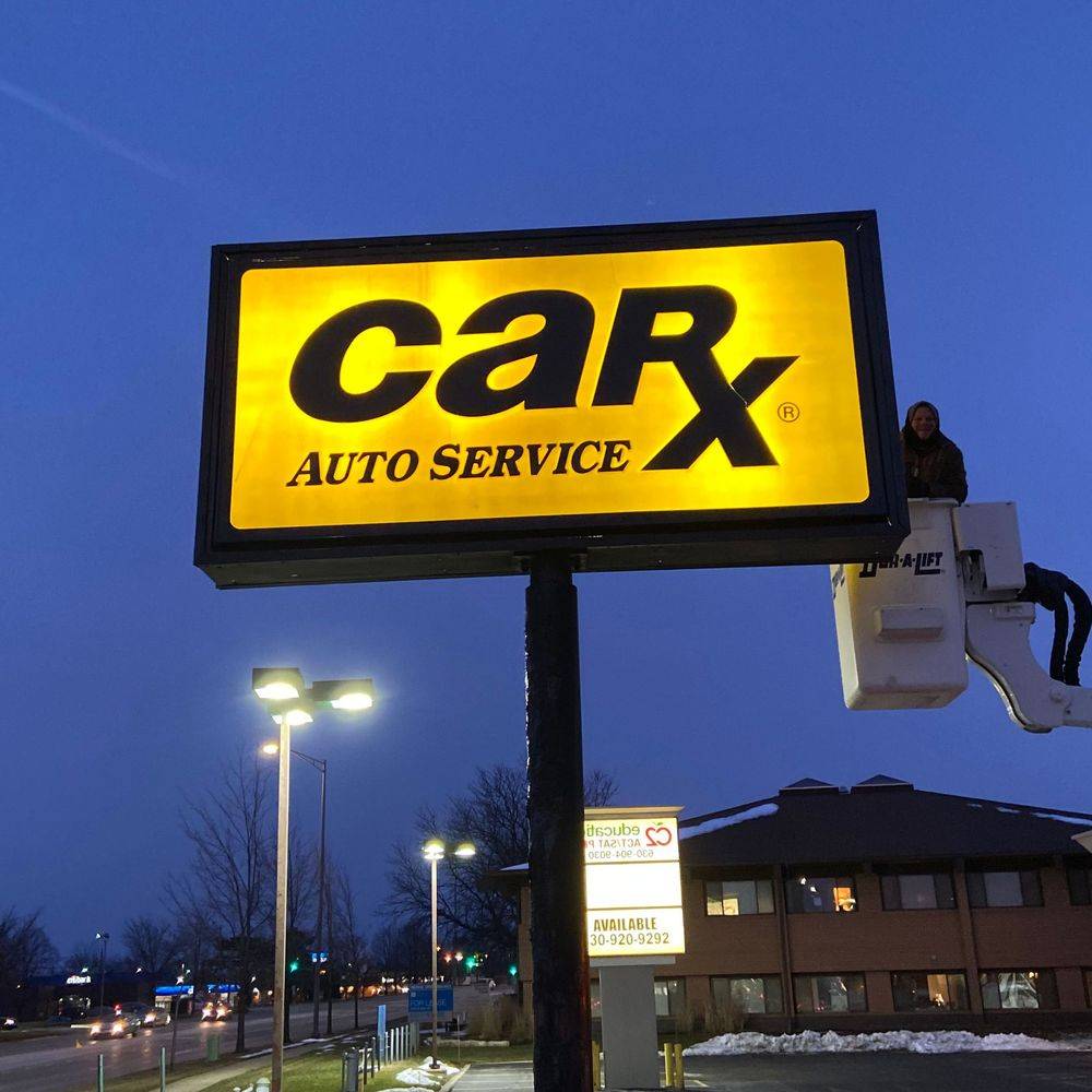 Illuminated roadside business sign